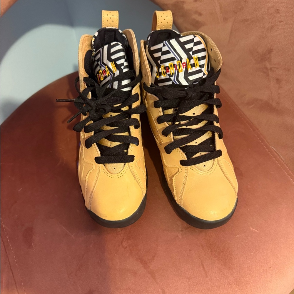 Jordan Tan and Black High-Top Sneakers